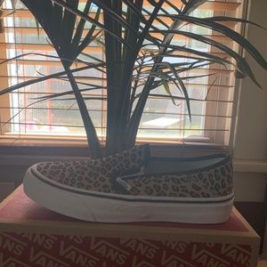 Brand new vans slide on sneakers. Received wrong size. Never worn.